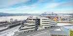 Luftaufnahme des Cargo Terminals Graz mit moderner Architektur und Containerkran.