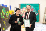 L.H. Christopher Drexler presented the Medal of Honor to artist Herbert Brandel (left).